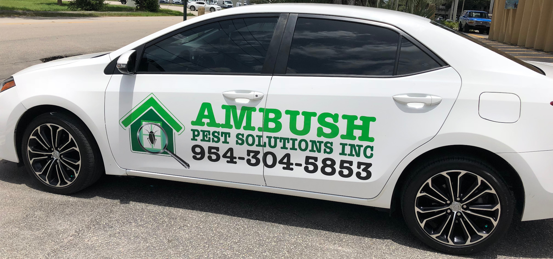 Ambush Pest Solutions service vehicle in Coconut Creek